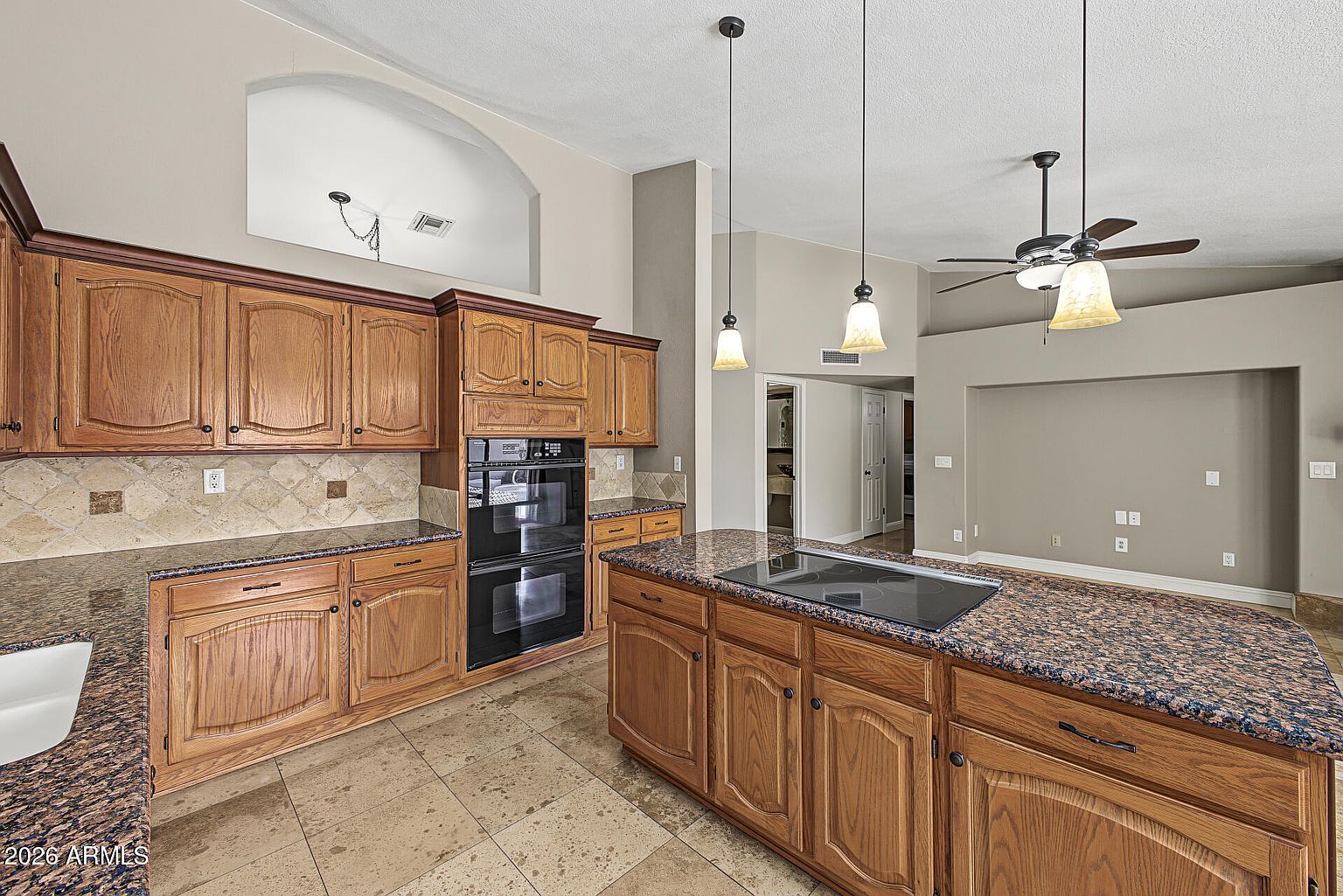 Kitchen, by the ovens, original listing photo